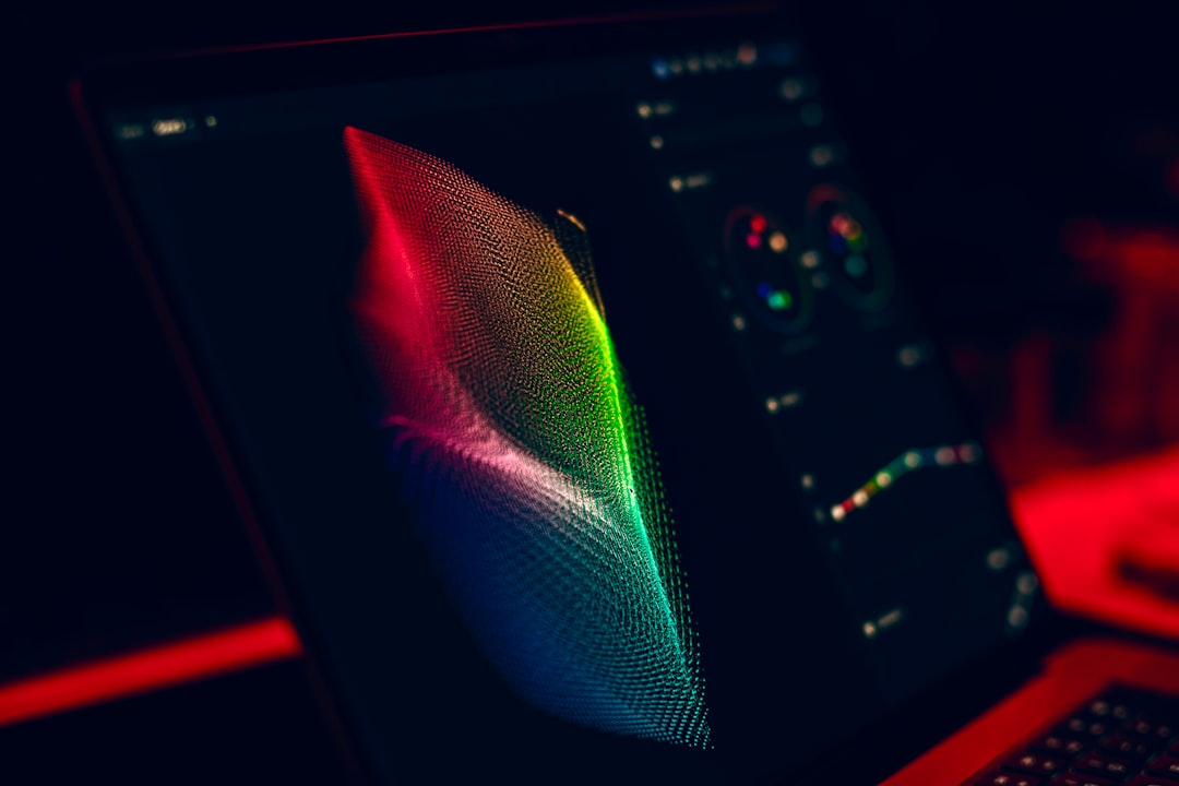 a close up of a laptop with a colorful screen