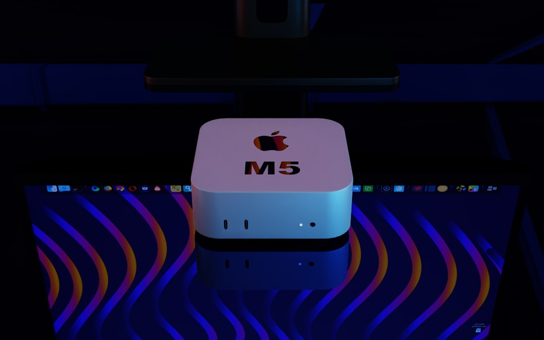 Apple m5 computer with colorful background