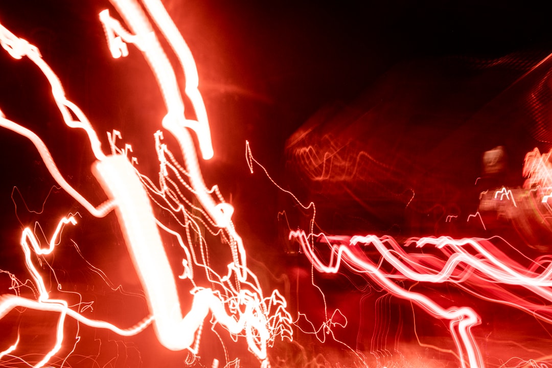 a blurry photo of a street light at night