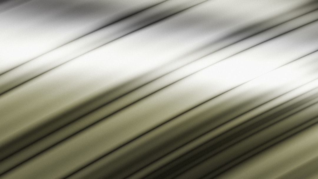 Abstract image with diagonal black and white lines.